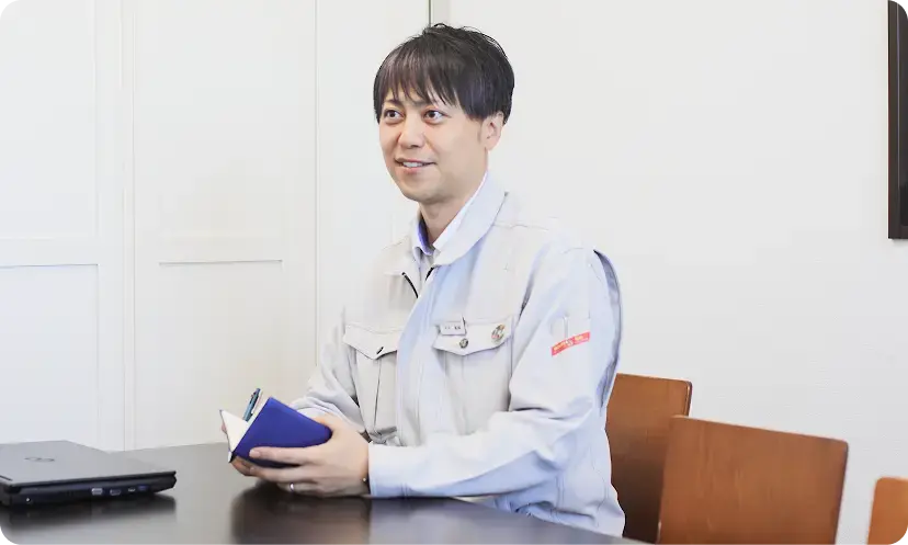 プレゼンをするスタッフ